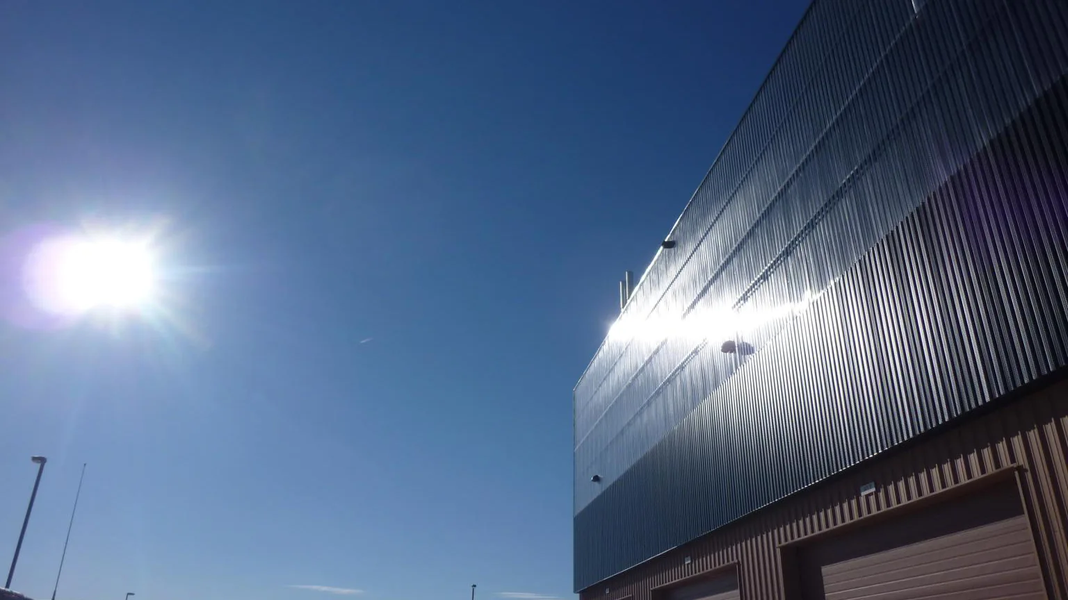 SolarWall collector façade illuminated by the sun